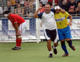 A Brazilian coach celebrates with one of the players after beating England in the Blind Football World Cup.